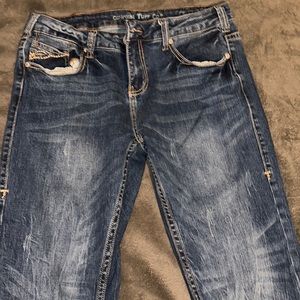 Cowgirl Tuff jeans. 32R
